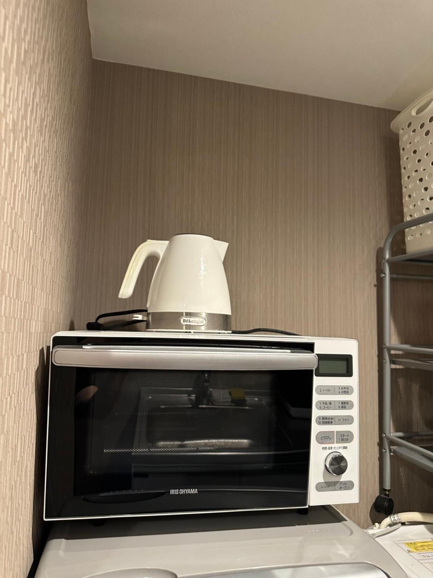 Appartement 睛空塔热门旅游景区 最近车站步行3分钟 机场直达 周边有便利店 商场 温泉 购物餐饮方便